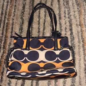 Orange and white coach purse